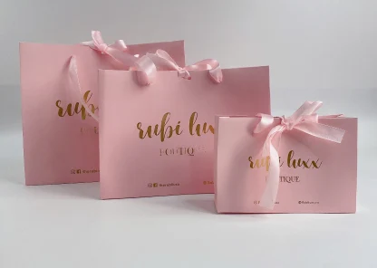 Custom logo Luxury pink Card Board Shopping Paper Bag Cardboard Paper Gift Bag with Handles and Bow